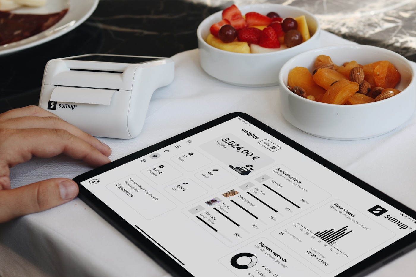 Tablet point of sale device on a restaurant table