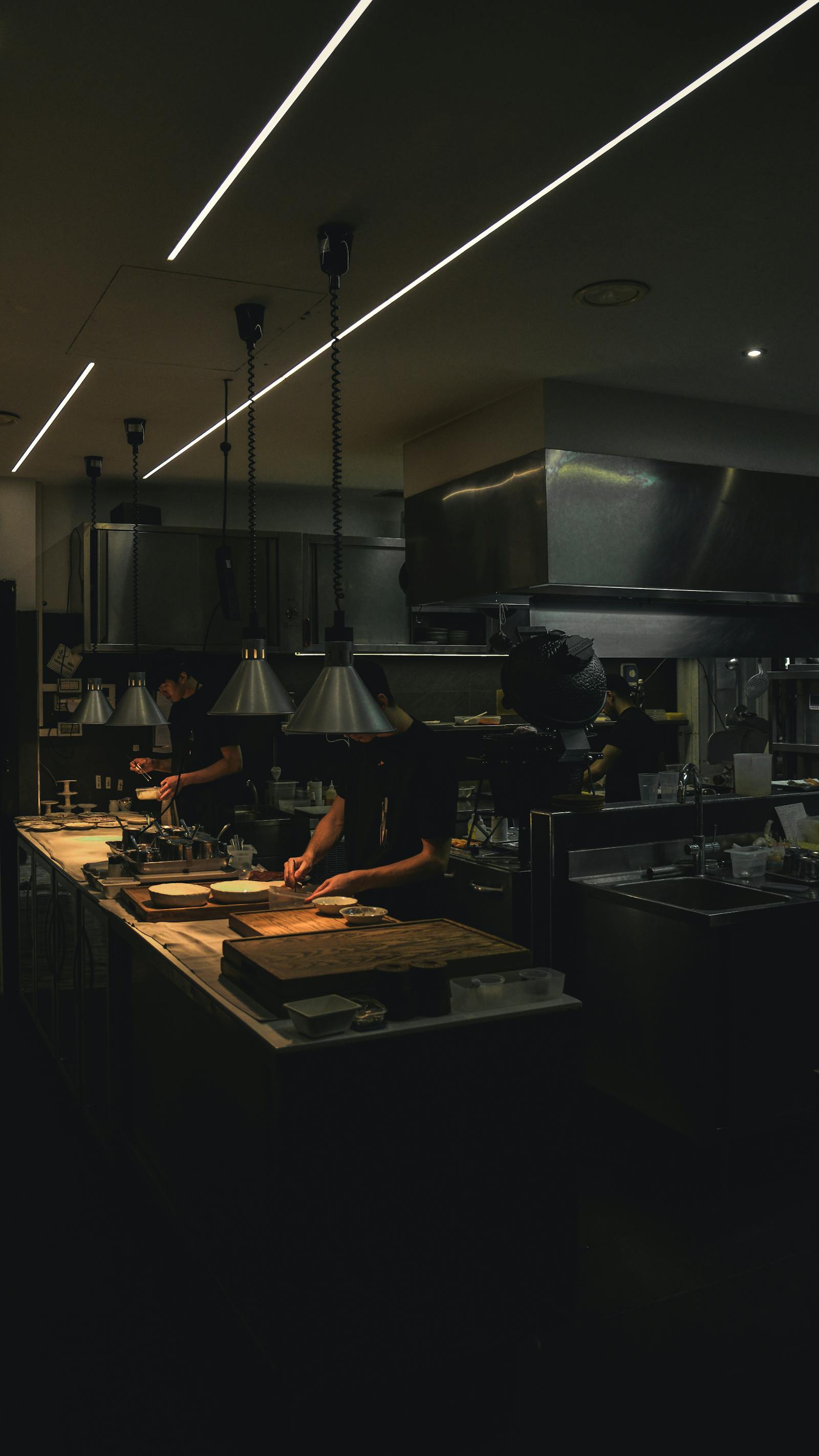 Professional restaurant kitchen team during live service