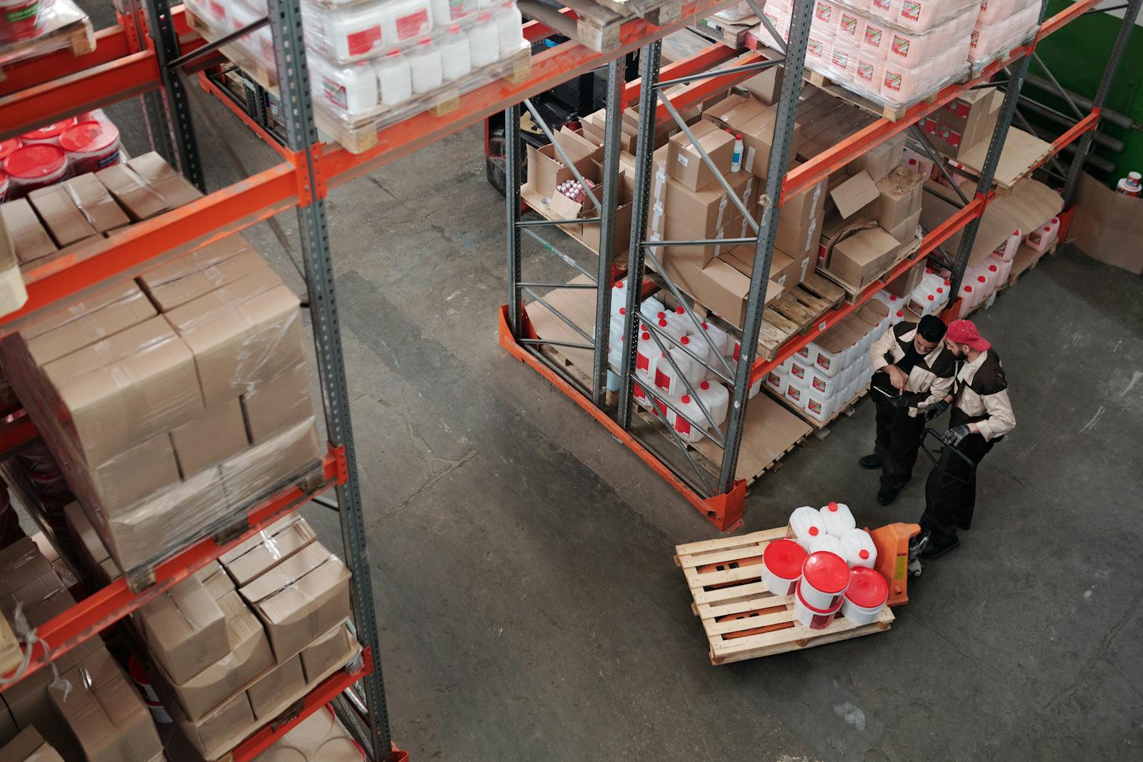 Warehouse team checking stock and operations across shelves